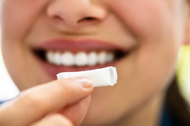 Woman using Nicotine Tobacco Snus Product